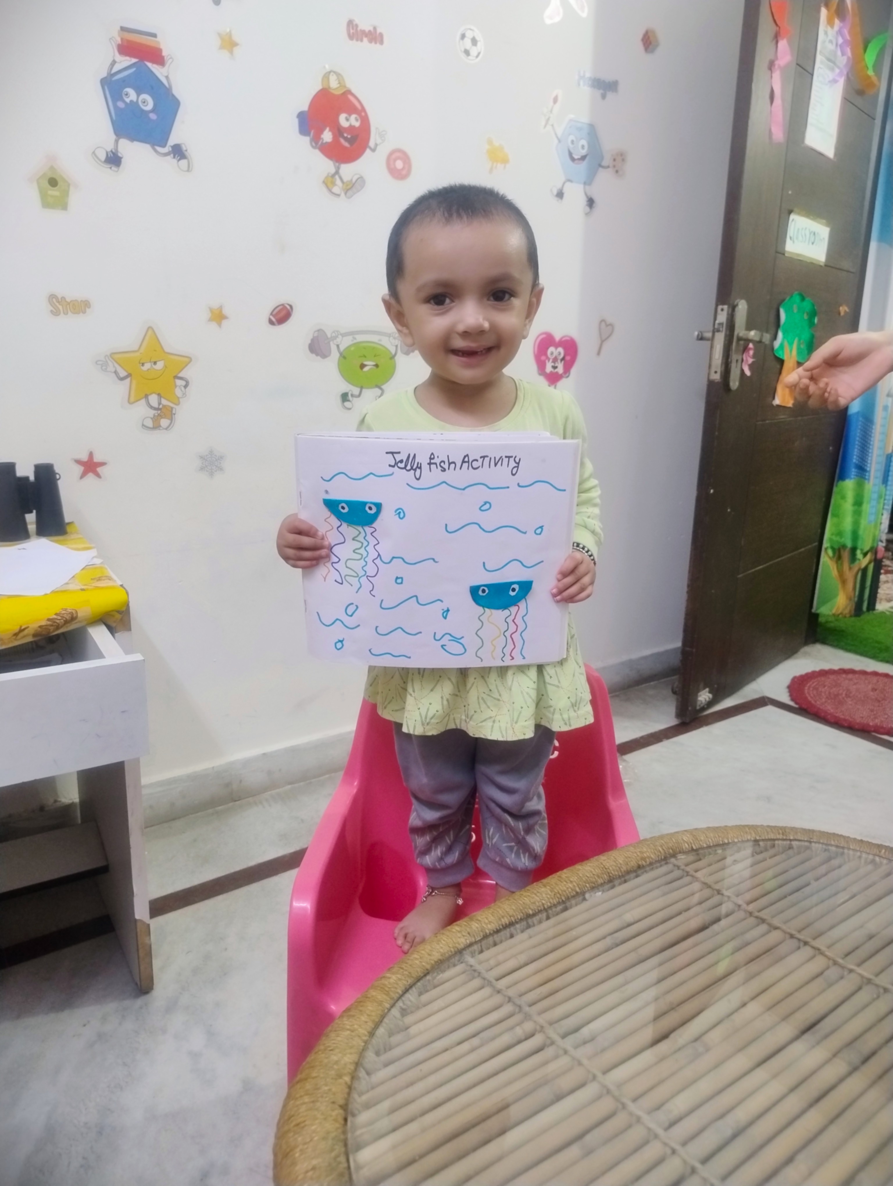 Three children engaged in a learning activity